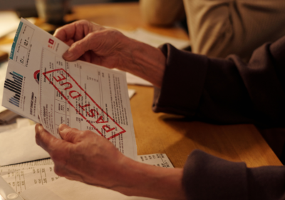A person holding a debt notice