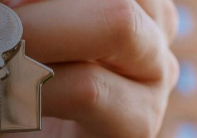 person with key 2
