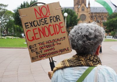 No excuse for genocide placard