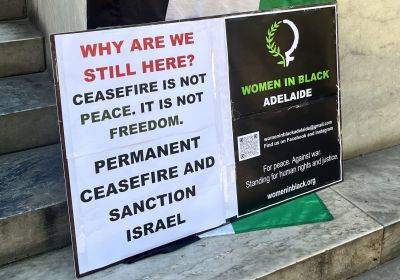 Cropped photo of sign at Palestine solidarity event
