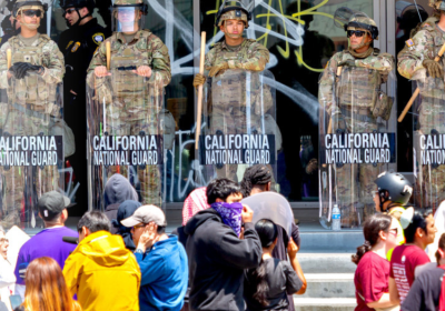 people standing outside a building
