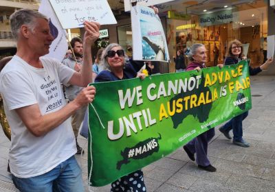 Cropped photo of refugee solidarity protesters