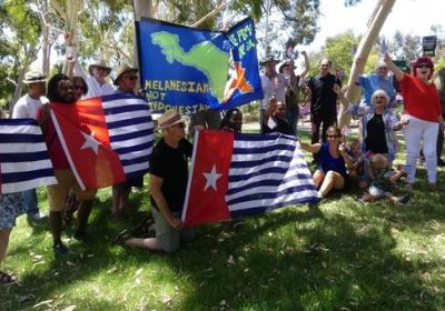 Cropped photo of West Papua Independence supporters in Australia