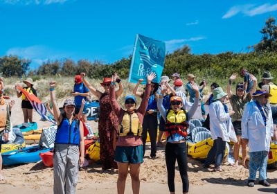 Cropped photos of kayakers at Rising Tide