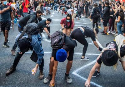 Cropped photo on Invasion Day Rally in Brisbane, year and photographer unknown.