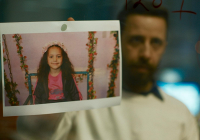 Dispatcher holds a photo of Hind Rajab