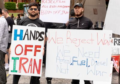 people holding signs