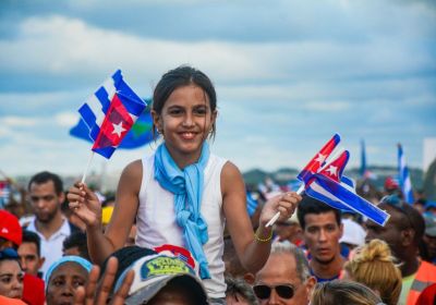 Young girl with Cuban flags