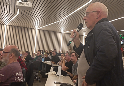 person speaking with microphone