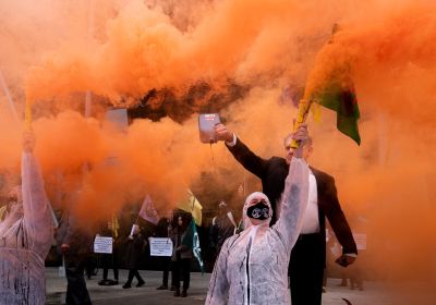 Dramatic image with smoke from a climate protest