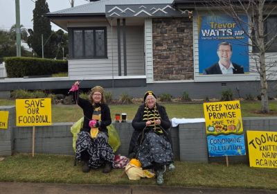Photo of Toowoomba Knitting Nannas Against Coal & Gas outside the office of Trevor Watts