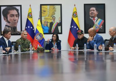 Delcy Rodriguez and ministers at a table