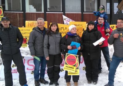 group of people holding signs