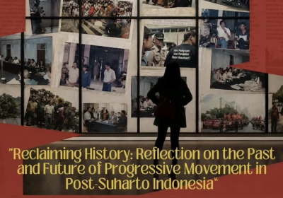 person stands in front of pictures on a wall