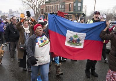 protesters carrying banners