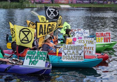 Activists in kayaks at a Extinction Rebellion South Australian action in Tarntanya
