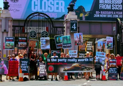 Photo of protest outside Brisbane Race Club with supporters from the Coaltion for the Protection of Racehorses
