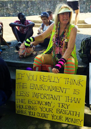Try holding your breath while counting your money placard.