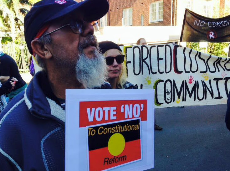 Vote No To Constitutional Reform placard.