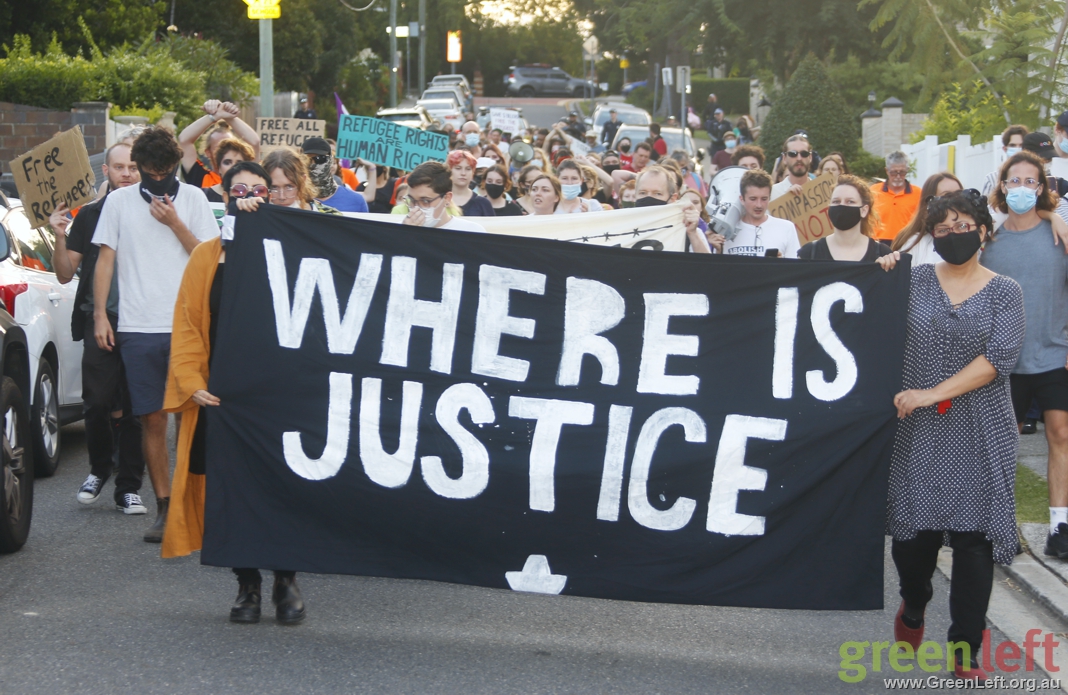 Refugee rights banner reading "Where is justice?" Refugee rights banner reading "Where is justice?"